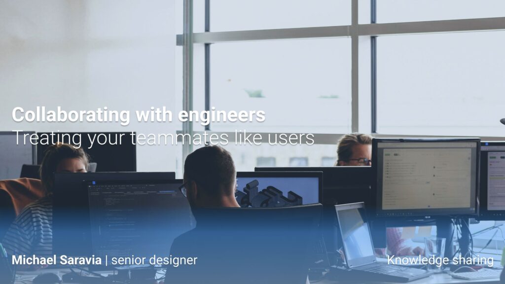 Designers and engineers working in front of computer screens in a modern office